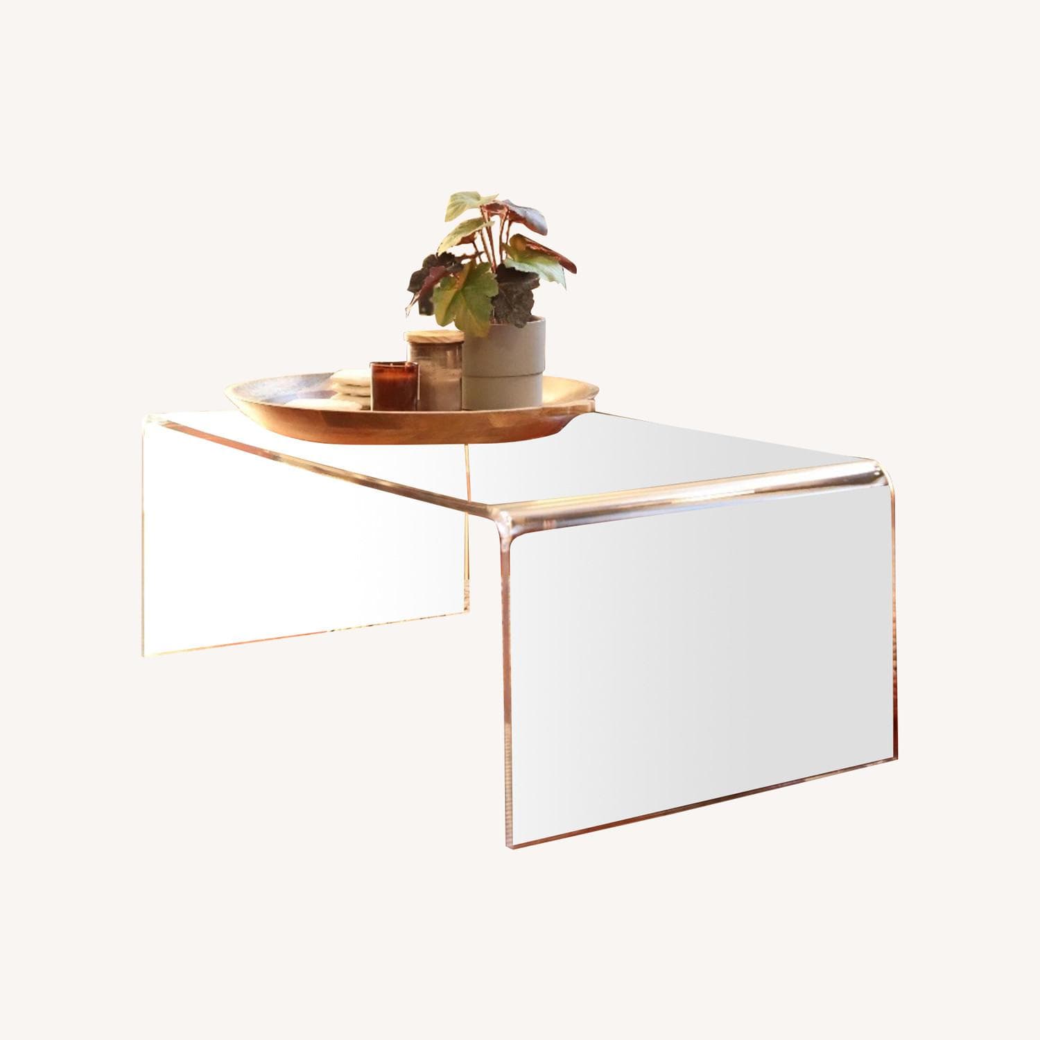 CB2 Peekaboo Acrylic Coffee Table - AptDeco